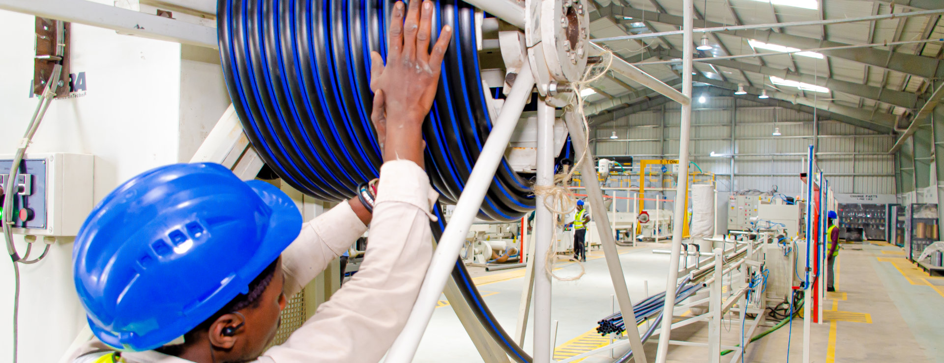 a male working inside a warehouse
