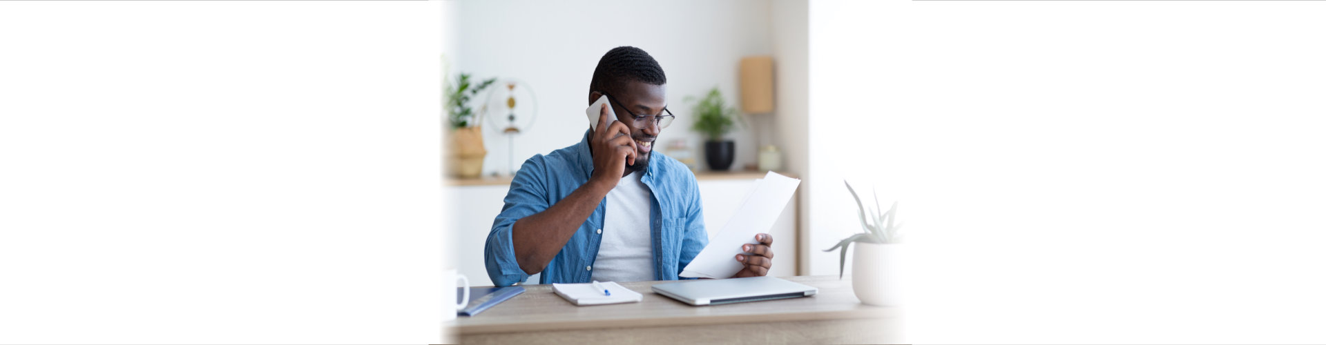 male holding a phone